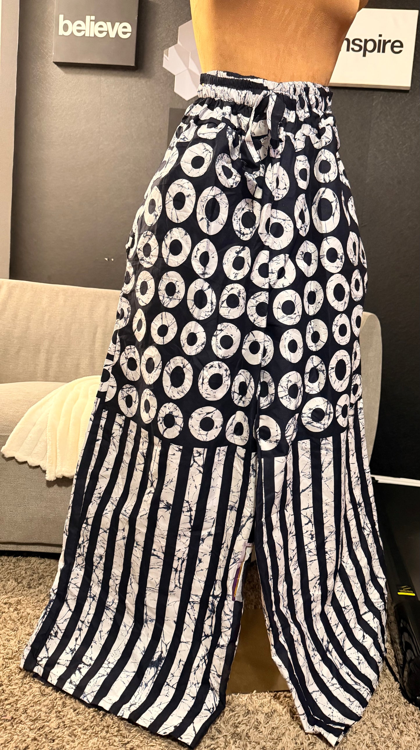 Black and white Ankara Pants, Elastic with rope waist, Two side pockets, Fits a size small to size 12