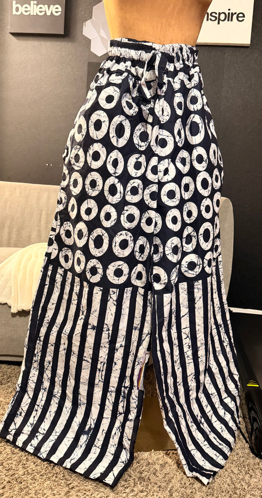 Black and white Ankara Pants, Elastic with rope waist, Two side pockets, Fits a size small to size 12