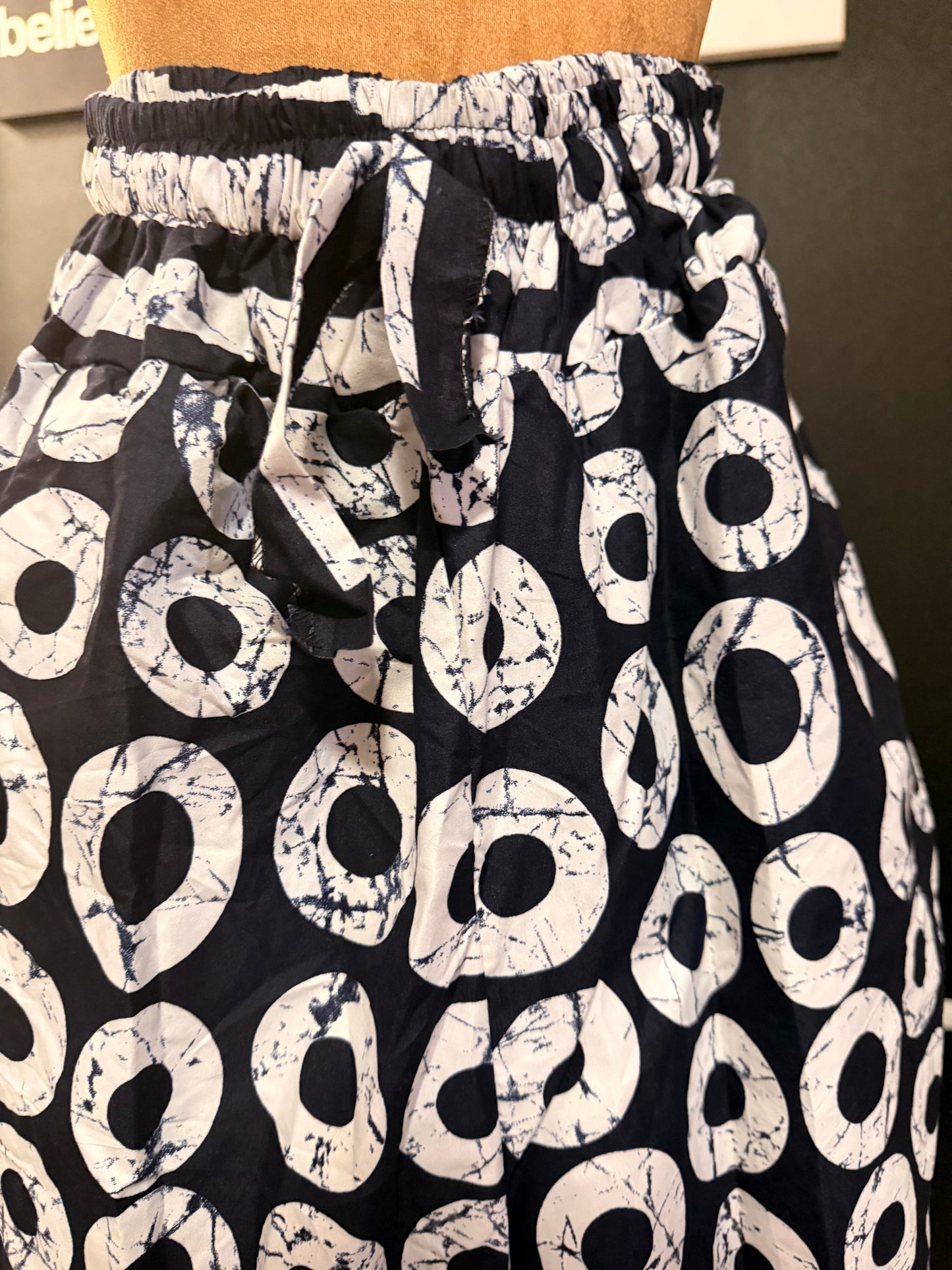 Black and white Ankara Pants, Elastic with rope waist, Two side pockets, Fits a size small to size 12